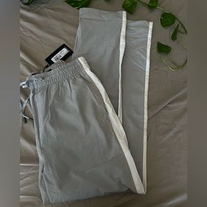 Grey and white light weight track pants